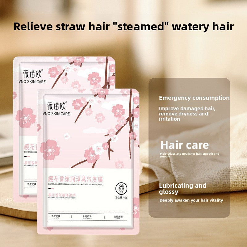 Two Vino Skin Care hair mask packages with cherry blossom design on a wooden surface.